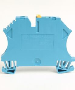 Blue modular electrical terminal block module used for wiring connections, viewed from the side with wire-slot openings visible