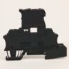 Side view of a black modular electrical terminal block with mounting clips on a white background.