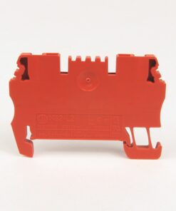 Red plastic electrical connector module with side clamps and a central circular recess, shown from the side.