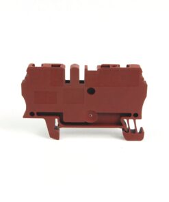 Red plastic terminal block module with side hooks, isolated on white background (electronics / electrical component)