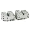 Two gray modular terminal blocks with multiple circular wire-entry holes on top, used for electrical connections (pair of blocks).