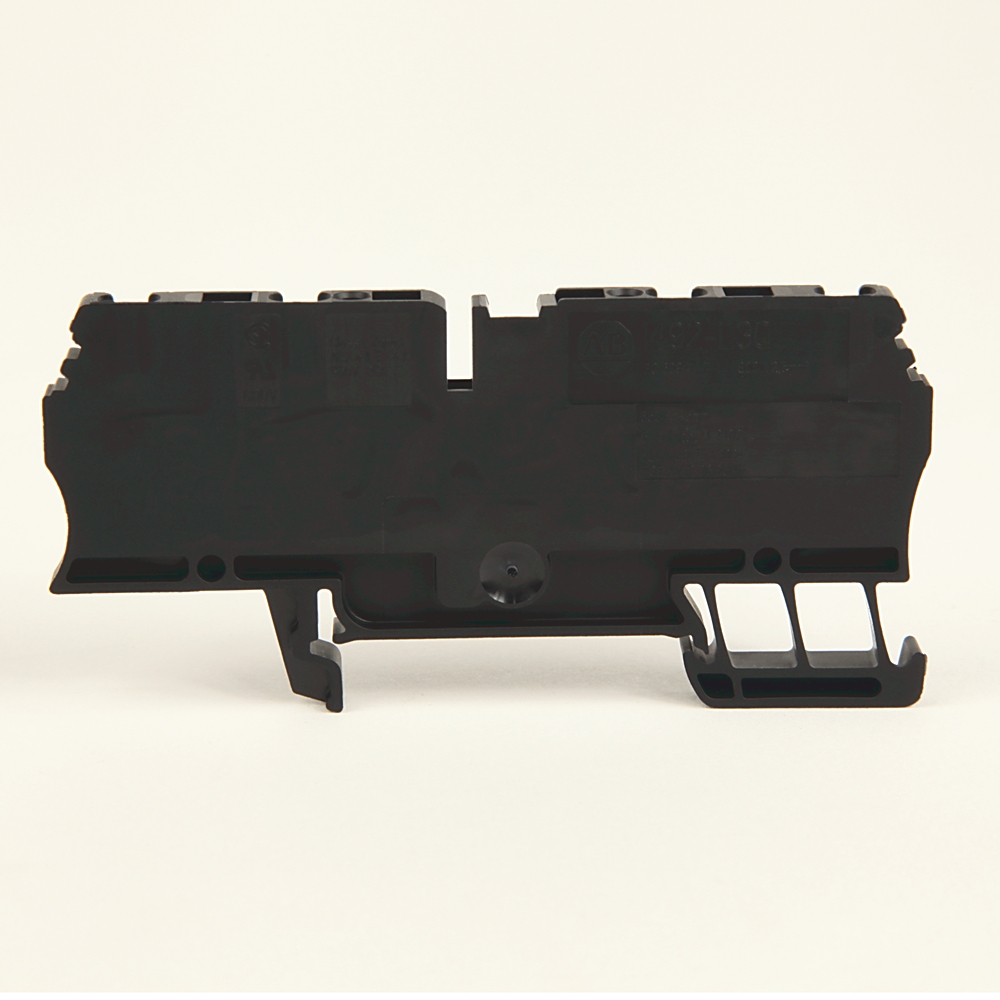 Black plastic modular electrical component with mounting clips, viewed from the side (likely a terminal block or DIN rail module).