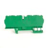 Green plastic electrical terminal block module with multiple connection slots, side view, unused for wiring.