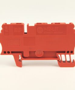 Orange plastic electrical terminal block with multiple slots and mounting clip, viewed from the side.