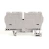 Gray DIN-rail mounted terminal block module with mounting clips and labeled ports