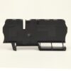 Black plastic electrical module viewed from the side, with mounting feet/brackets visible under it.