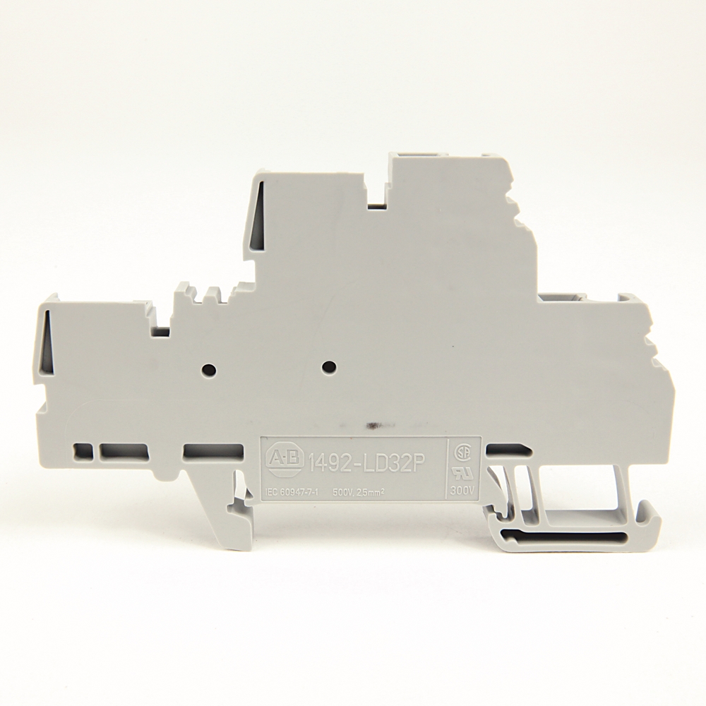 Gray plastic modular electrical terminal block housing with mounting clips, shown from the side