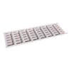White plastic slotted tray with many evenly spaced rectangular slots, viewed at an angle.