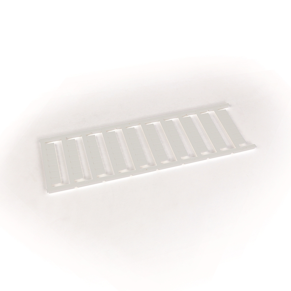 White plastic slotted strip with multiple evenly spaced rectangular slots on a light background.