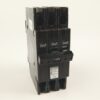 Three-pole circuit breaker with a 20A handle (Allen-Bradley), shown from the side against a white background.