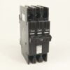 Three-pole 30A circuit breaker with three On/Off switches in a vertical row (Allen-Bradley) on a neutral background.