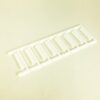 White plastic mounting frame with multiple evenly spaced comb-like slots for holding items