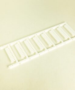 White plastic mounting frame with multiple evenly spaced comb-like slots for holding items