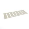 White plastic slotted rack with many rectangular slots laid on a white surface.