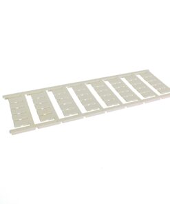 White plastic slotted rack with many rectangular slots laid on a white surface.