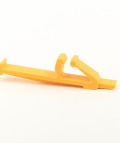 Yellow plastic toy part with an angled lever on a white background.