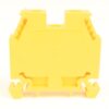 Yellow plastic electrical mounting block with side clips and terminal slots for wiring harnesses