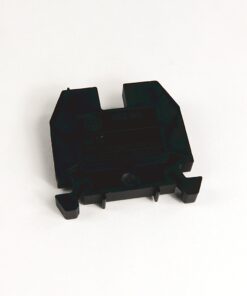 Black plastic electrical component with three bottom pins and side mounting clips, intended for PCB mounting