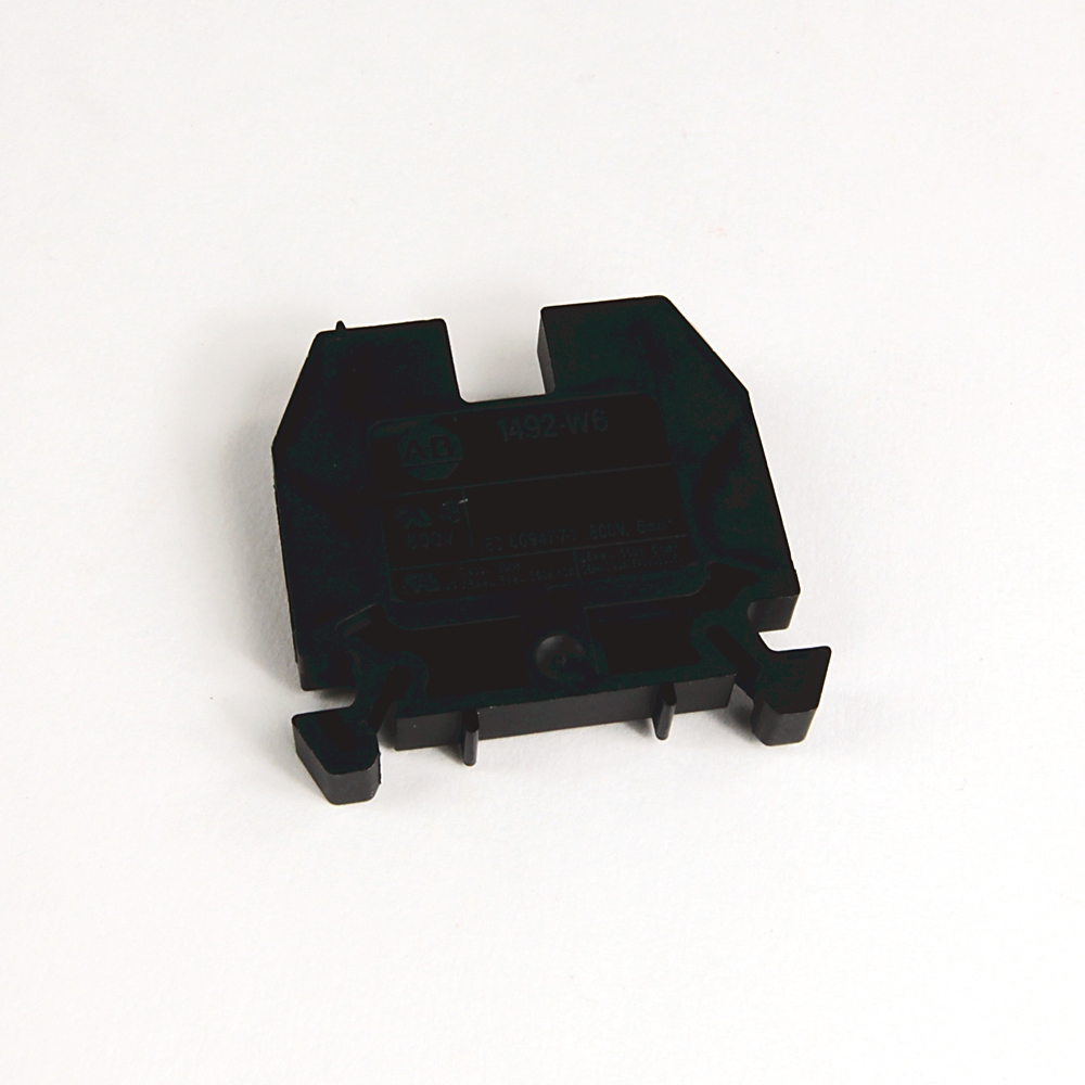 Black plastic electrical component with three bottom pins and side mounting clips, intended for PCB mounting