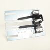 Dual hard drive sled with two black latch levers on a metal tray for server use.
