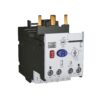 Industrial control relay/contactor with blue circular reset button, red stop button, test/status indicators, and terminal screws on a white front panel with copper top terminals.