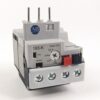 Electrical relay module with four screw terminals and a white front panel, labeled 193-K Class 10A, showing trip/test switches and a round adjustment knob.