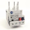 Miniature relay with screw terminals labeled 97 NO 98 and 95 NC 96, red and blue indicator buttons, white housing.