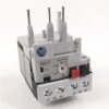 AB-brand industrial relay with four screw terminals on a white front plate labeled 97 NO 98 95 NC 96 and a small adjustment dial, for controlling circuits in a panel.