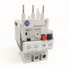 Electrical contactor/relay unit with screw terminals and small red and blue actuating blocks, labeled terminals 97–98 and 95–96, gray plastic housing.