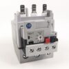 Industrial electrical contactor with AB logo, gray body, red/blue terminal blocks, and labeled terminals (2,4,6) for switching mains power