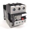 Three-pole electrical contactor with gray front, black body, and terminal screws labeled L1–L3 on top and T1–T3 below; used to switch motor power in electrical control circuits.
