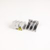 Gray modular electrical terminal blocks with a yellow high-voltage warning sign on a white background.