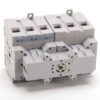 Three-pole modular circuit breaker block with mounting lugs and terminal slots (electrical component).