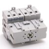 Four-pole miniature circuit breaker module with four terminal slots and mounting lugs